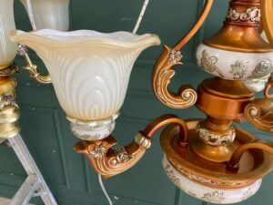 Chandelier, glass pendant lamp, floral pattern, brown and white color.