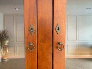 Teak wood display cabinet/storage cabinet with 3 glass doors, 3 wooden doors, and 3 drawers.