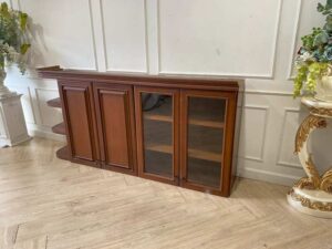 Wooden wall cabinet with shelves, 2 drawers, 2 doors, and 1 storage compartment.