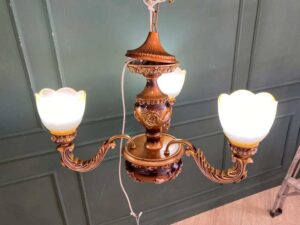 Chandelier, glass pendant lamp, rose pattern, brown color.
