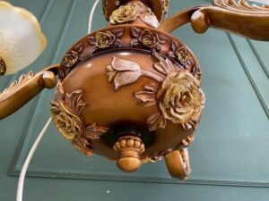 Chandelier, glass pendant lamp, rose pattern, brown color.