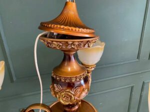 Chandelier, glass pendant lamp, rose pattern, brown color.