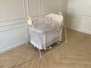 Electric baby swing, Cradle Max brand.