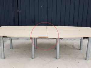 12-seat conference table, steel legs with power strip, light brown wood top (2)