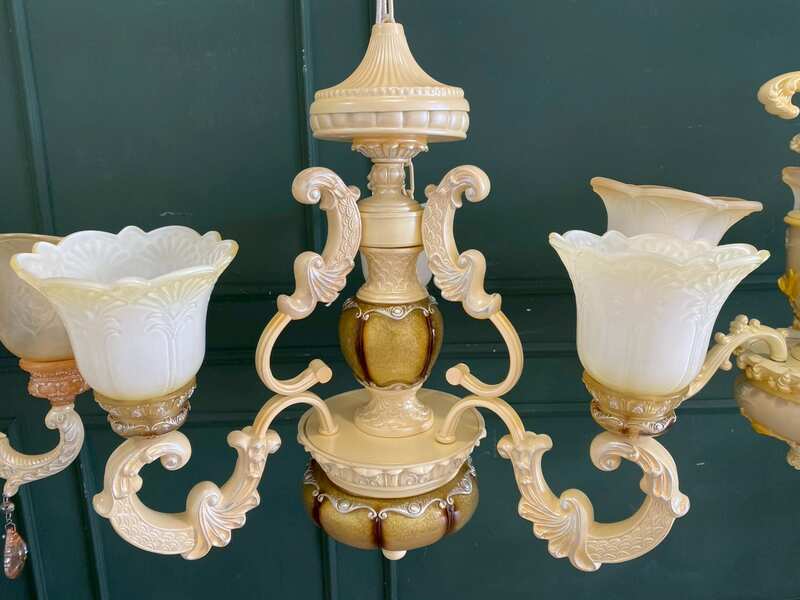 Cream-colored glass chandelier.