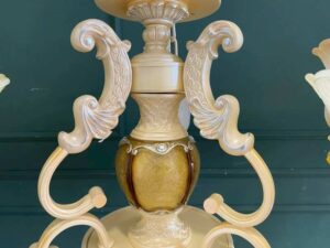 Cream-colored glass chandelier.