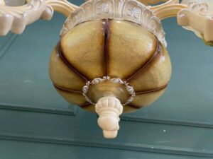Cream-colored glass chandelier.