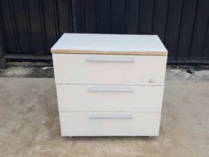 White wooden cabinet with 3 drawers