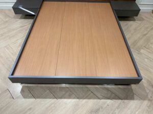5-foot dark brown wooden bed, SB FURNITURE brand.