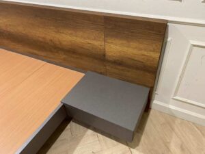 5-foot dark brown wooden bed, SB FURNITURE brand.