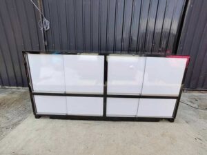 230 cm LED Glass Display Counter with Pink–Black Base and Tiered Shelves
