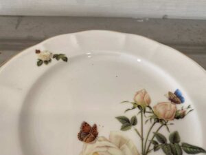 Ceramic plate with white rose pattern and gold rim, Quality Ceramic brand, 21 cm.