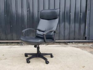Executive office chair, black leather cushion