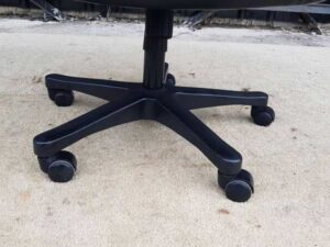 Executive office chair, black leather cushion