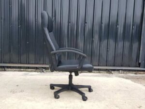 Executive office chair, black leather cushion