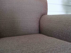 Armchair, European design, thick brown fabric upholstery, wooden frame._3JBOTY3N4Q_F0A6QIVES1