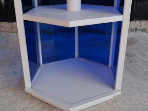 Hexagonal product shelf, steel frame, blue acrylic frame._GORW0547WP