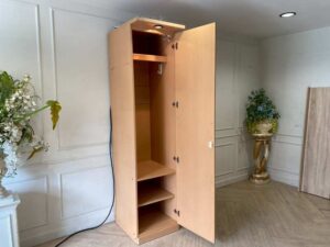 Cream-colored wooden cabinet with 1 door