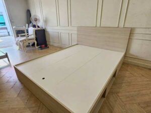 5-foot wooden bed with 2 side storage compartments.