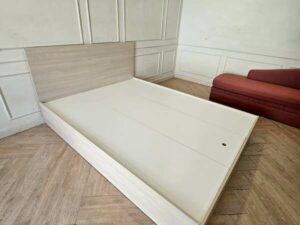 5-foot wooden bed with 2 side storage compartments.