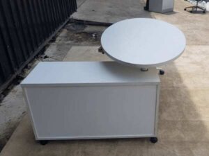 Oval office desk, steel legs, white surface, with document cabinet and wheels