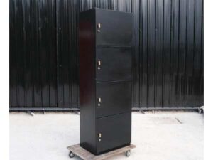 Tall wooden cabinet with 4 doors, opens to the left, black, has storage compartments inside._JRJSD6JFML