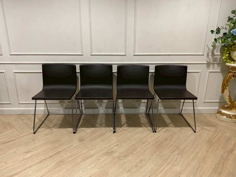IKEA chair with metal legs and dark brown leather upholstery