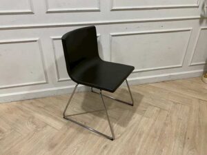 IKEA chair with metal legs and dark brown leather upholstery