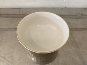 Ceramic cup with white rose pattern and gold rim, Quality Ceramic brand.