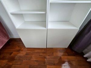 White wooden shelving unit with 2-door storage (1)