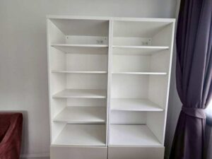 White wooden shelving unit with 2-door storage (1)