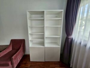 White wooden shelving unit with 2-door storage (1)