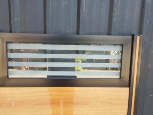 Solid brown partition with black stripes