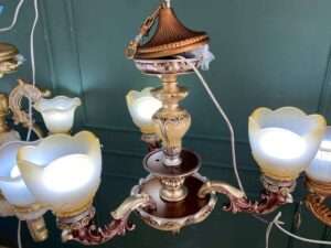 Vintage style chandelier, purple and cream colors.