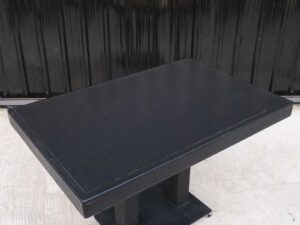 Black wooden frame table, steel legs, with wheels, hotel grade work._L94DQ0PP0K