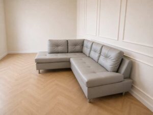 4-seater L-shaped sofa, grey leather upholstery, steel legs, Index brand, Ovira model.