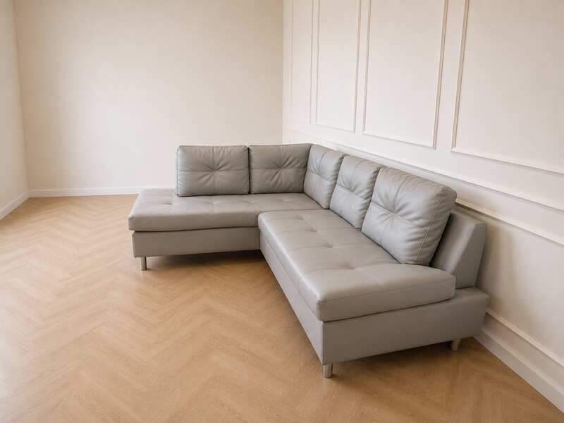 4-seater L-shaped sofa, grey leather upholstery, steel legs, Index brand, Ovira model.