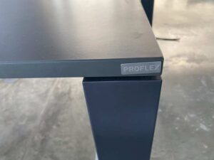 PROFLEX brand dark brown steel leg office desk.