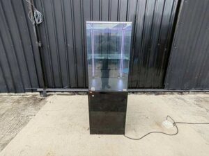 Tall black glass jewelry display cabinet with LED lighting