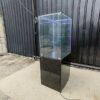 Tall black glass jewelry display cabinet with LED lighting