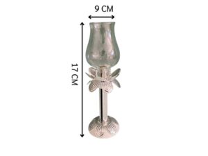 Silver glass-encased candlestick lamp.