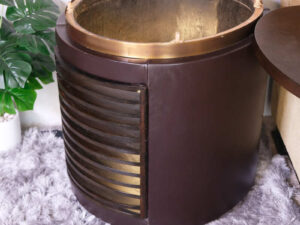 Hotel side table, wooden top, brown leather cover. Golden lid edge Inside is spacious for storing things._N4R65MGWUE