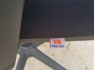 Proflex office chair with fabric upholstery, plastic legs, and a black mesh backrest._N9ETZ4CMH3