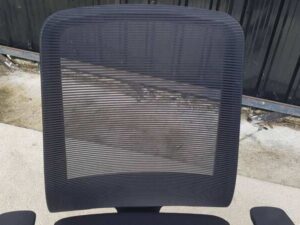 Proflex office chair with fabric upholstery, plastic legs, and a black mesh backrest._N9ETZ4CMH3