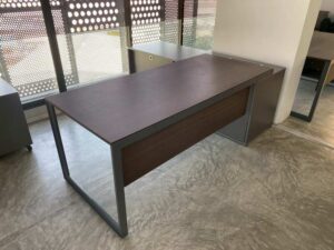 Executive L-shaped corner desk with 3 drawers, 2 shelves, and power strip. PROFLEX brand.