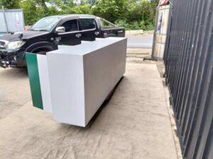 Multipurpose wooden storage cabinet with 6 compartments, white with green stripes.