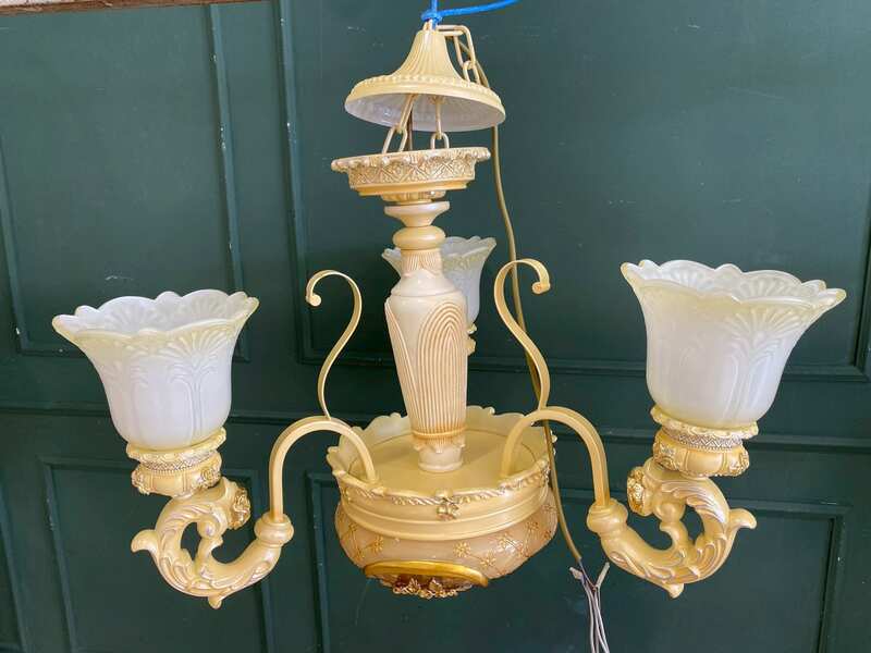 Glass chandelier with floral crown design