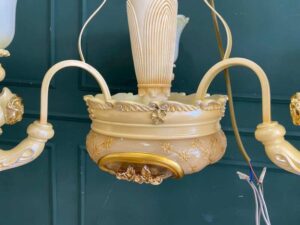 Glass chandelier with floral crown design
