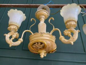 Glass chandelier with floral crown design