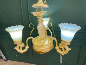 Glass chandelier with floral crown design
